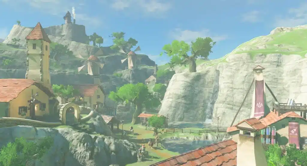 Hateno Village in Breath of the Wild with windmills, red roofed houses and the Ancient Tech Lab on the hill