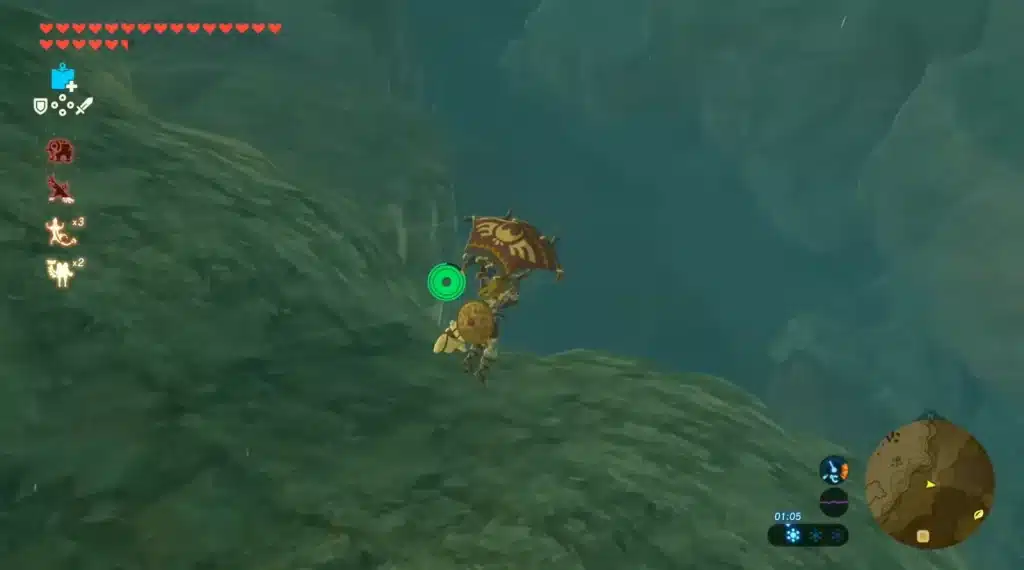 Link paragliding down a mossy cliff through light fog in Breath of the Wild