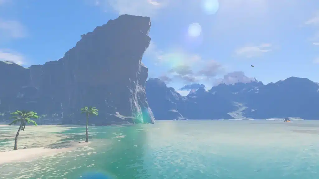 A sandy beach with palm trees and tall cliffs in The Legend of Zelda: Breath of the Wild