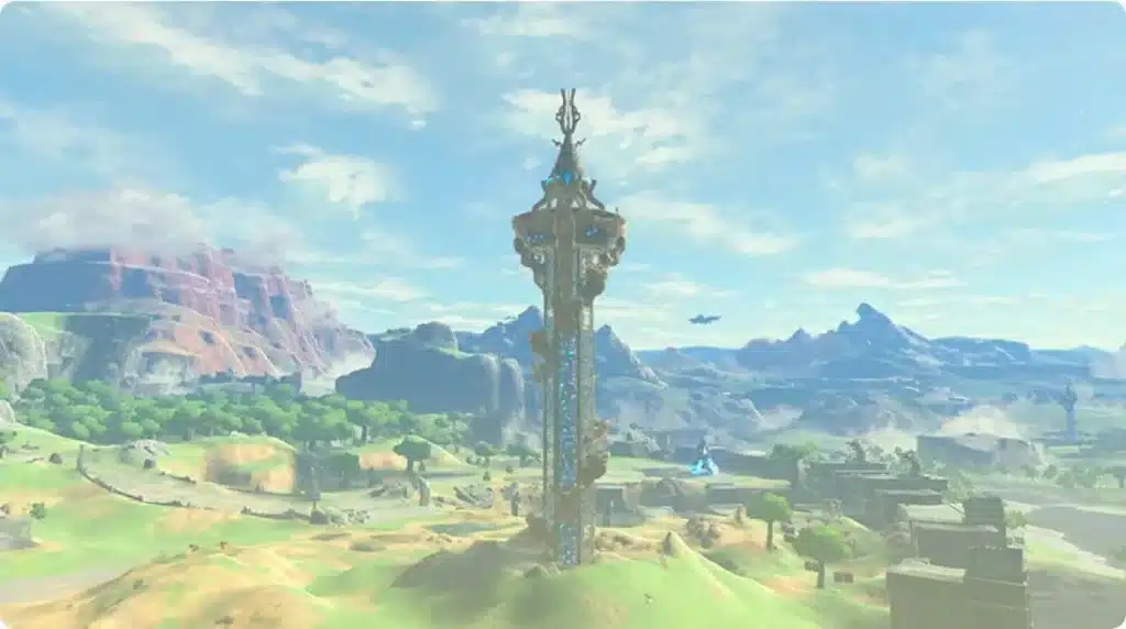 A Sheikah Tower rising over green fields and distant mountains in Breath of the Wild