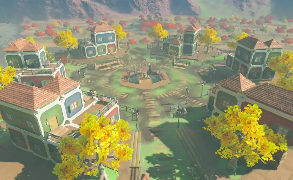 Overhead view of Tarrey Town's colorful houses and autumn trees on the island in Lake Akkala