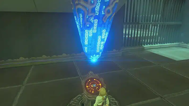 Link at a glowing Sheikah pedestal inside a shrine in Breath of the Wild