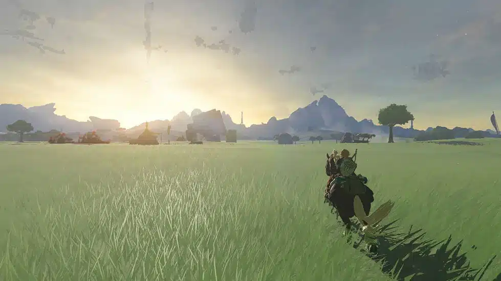 Link riding a horse across open grassland in Tears of the Kingdom