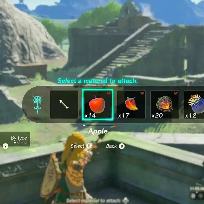 Link drawing a bow while the Fuse menu offers Apple, Fire Fruit and other materials to attach to an arrow