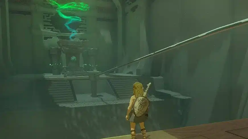 Link standing inside a Shrine of Light in Tears of the Kingdom looking toward the altar