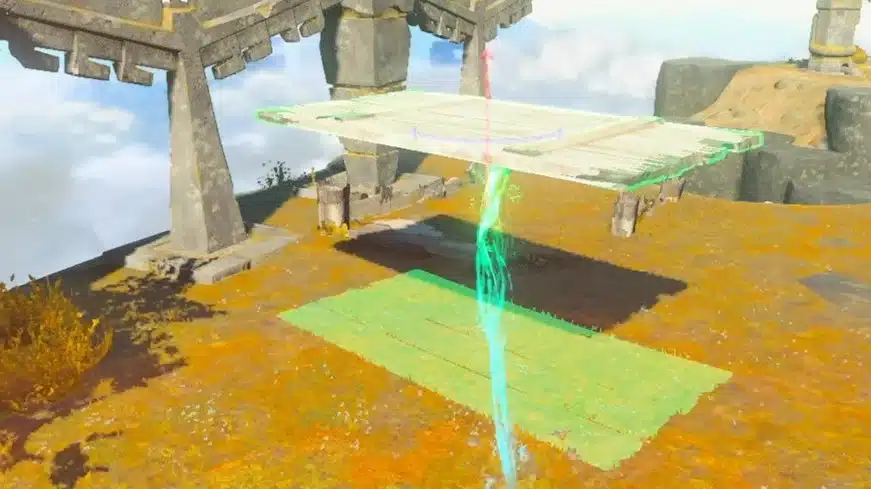 Link using Ultrahand to lift a stone slab with a green glow